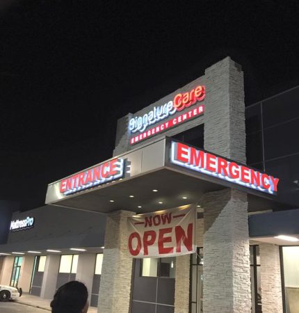 channel-letters-banner-outdoor-storefront-building-illuminated-backlit-sign